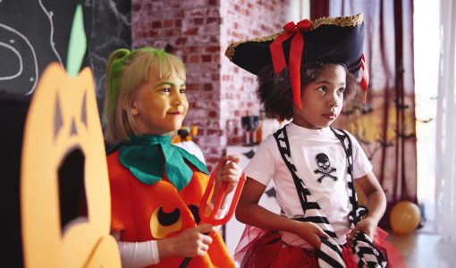 Two girls celebrating Halloween party